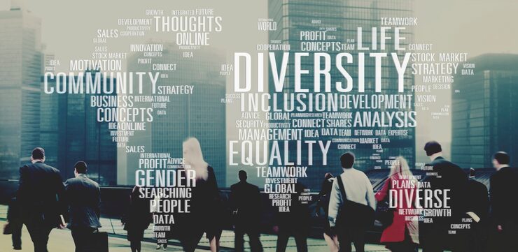 Silhouettes of diverse people walking with city skyline in background. Overlaid words like "Diversity," "Equality," and "Community" emphasize collaboration.